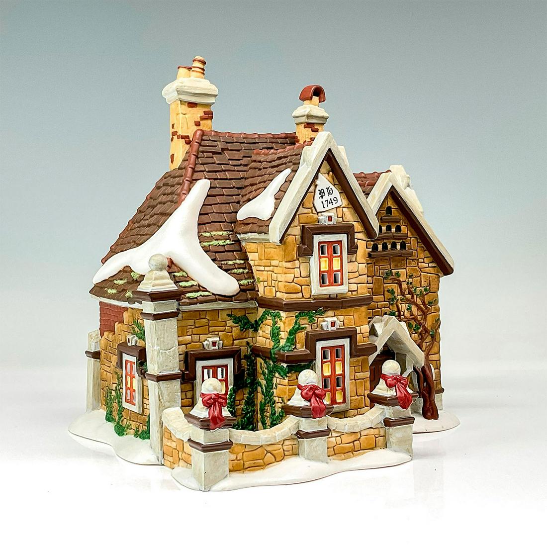 Department 56 Figurine, Tattyeave Knoll: Part of the Dickens' Village Series. Hand-painted porcelain figure modeled as a Victorian style cottage. Department 56 backstamps. This item has its original box with dimensions: 10.25"L x 9"W x 10"H.