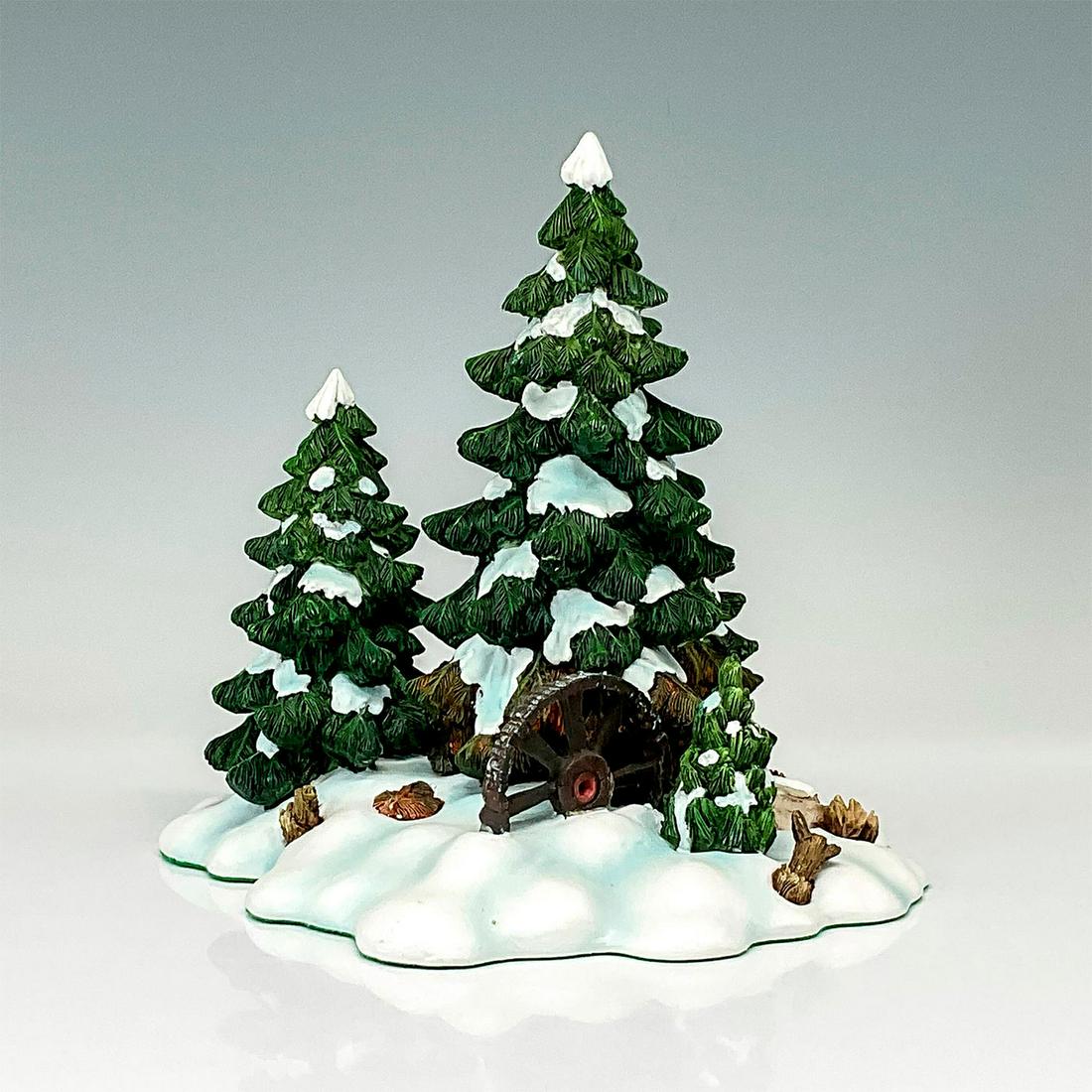 Department 56 Figurine, Wagonwheel Pine Grove: The figurine shows a wintery wilderness scene with a single wagon wheel covered halfway in snow. This item has its original box. The original box's dimensions: 8.5"L x 6.75"W x 8.25"H. Issued: 1995-19