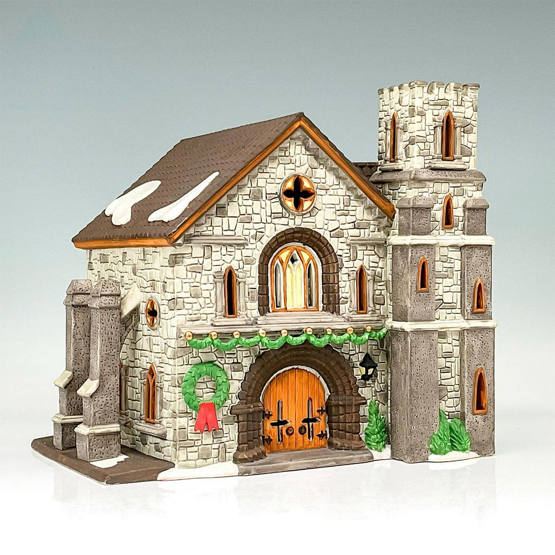 Department 56 Figurine, Whittlesbourne Church: A gray brick and stone church with an attached towers and multiple windows. This item has its original box. The original box's dimensions: 10.5"L x 8.75"W x 9.75"H. Issued: 1994-1998 Dimensions: 9.25"