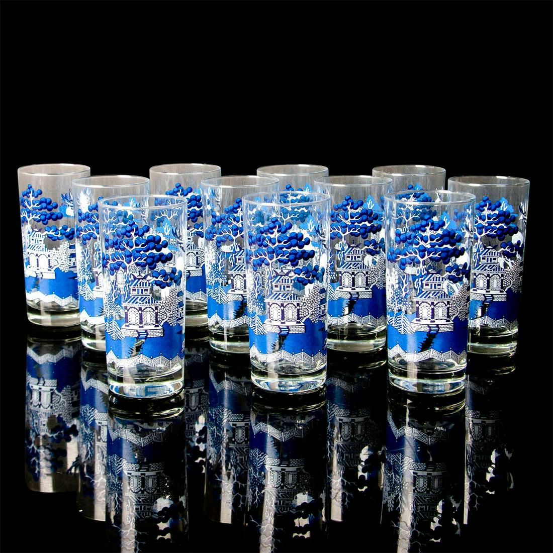 11pc Chinoiserie Blue Willow Water Glasses: Tall water glasses, clear glass with blue pattern on top. Issued: 20th Century Dimensions: 6.25"H x 2.5"dia. Manufacturer: Johnson Brothers Country of Origin: England