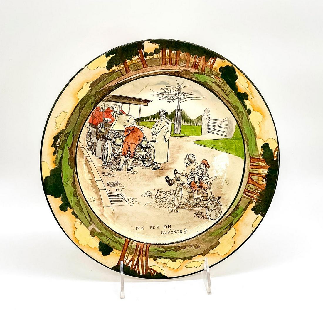 Royal Doulton Motoring Series Plate, Itch Yer On Guvenor?: Part of the Early Motoring Series Ware D2406. Plate with a scene of boys on a billycart gleefully overtaking a broken down motorist. Royal Doulton backstamp. Issued: 1905-1928 Dimensions: 1"H x 10.25"