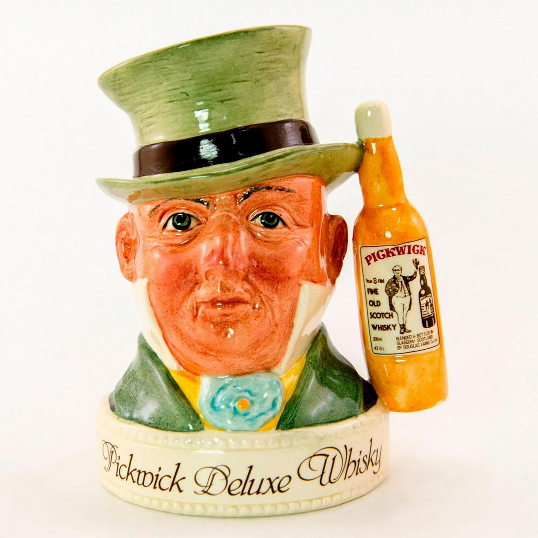 Royal Doulton Whisky Container, Mr. Micawber: Inscription Pickwick Deluxe Whisky. Pickwick scotch whisky handle. Royal Doulton backstamp. Good condition. Artist: Harry Sales Issued: 20th c. Dimensions: 5.5"H Manufacturer: Royal Doulton Countr
