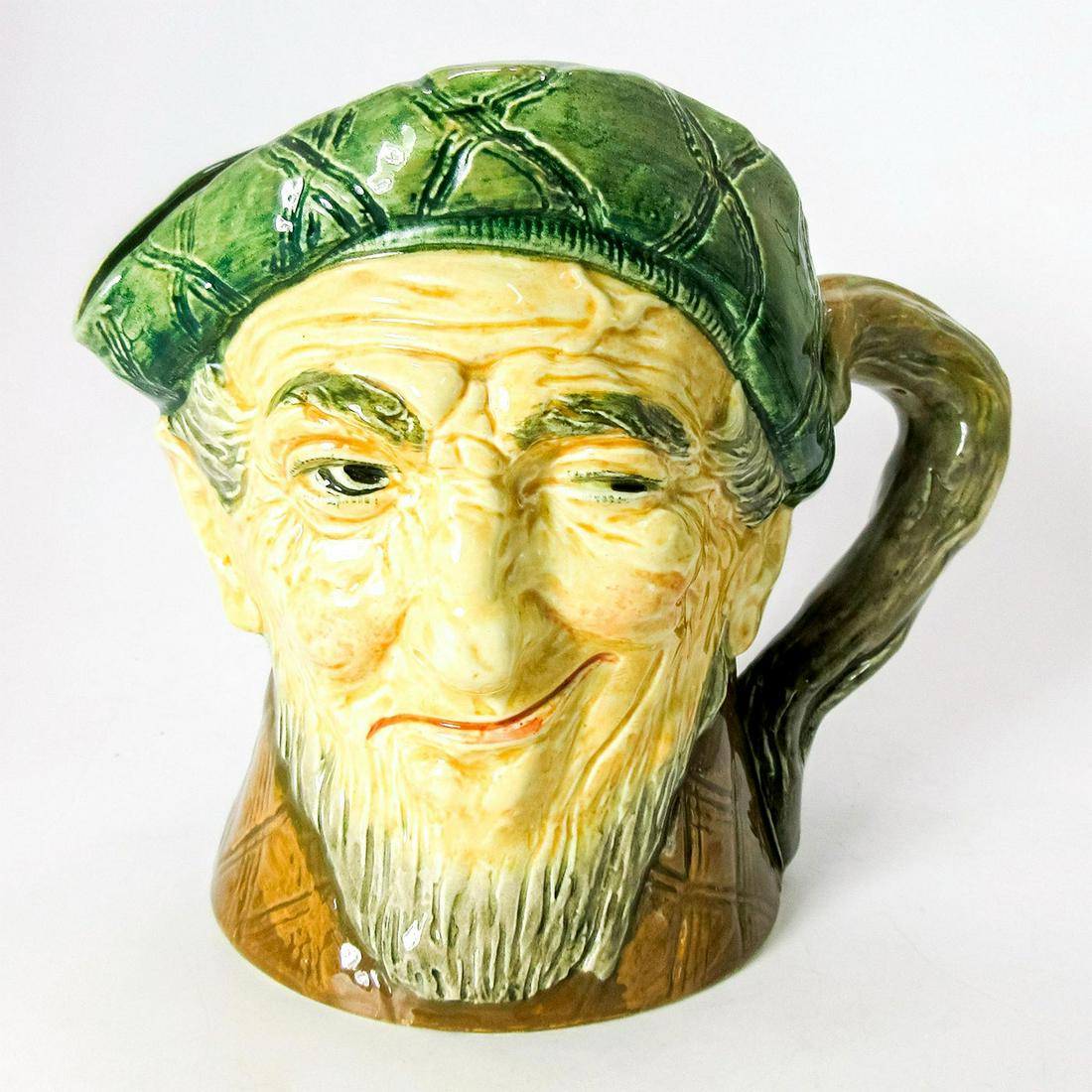 Auld Mac D5889 - Musical - Royal Doulton Character Jug: Green tam; brown coat. Musical jug plays the tune "The Campbells are Coming." A song by Sir Harry Lauder, a 20th-century singer and comedian, called "Bang Went Sixpence." inspired this piece. In it a