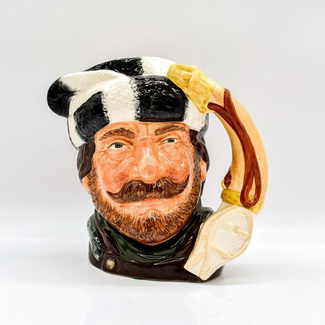 Trapper Centennial D6609 - Large - Royal Doulton Character Jug: Dark green and white hair; brown and green clothing. The Trapper is one of three jugs that received a special backstamp in 1967. The other two, the Lumberjack and the North American Indian, complete t
