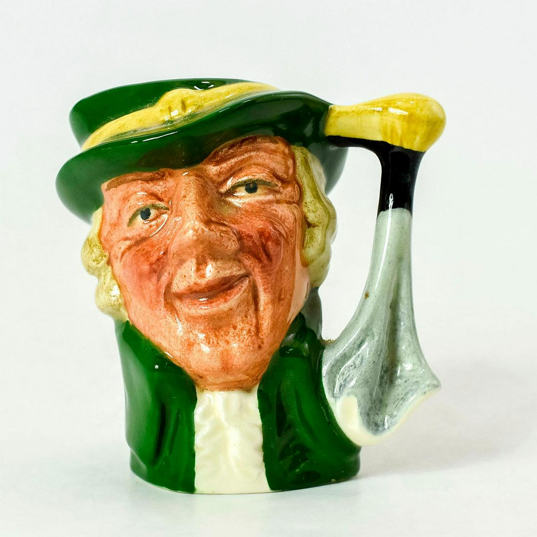 Regency Beau D6565 - Mini - Royal Doulton Character Jug: Green coat; green and yellow hat. Artist: David B. Biggs Issued: 1962 - 1967 Dimensions: 2.75"H Manufacturer: Royal Doulton Country of Origin: England