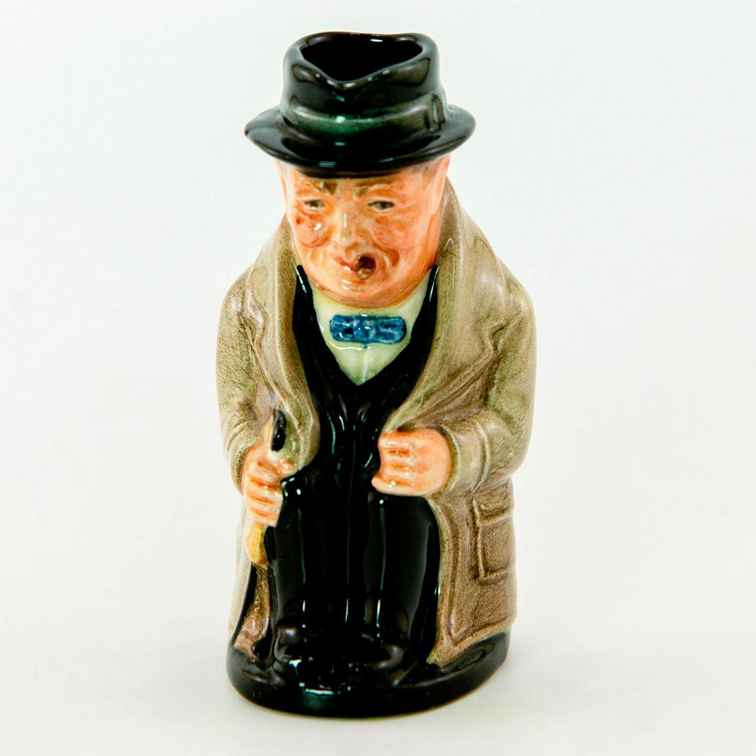 Winston Churchill D6175 - Small - Royal Doulton Toby Jug: Small glossy porcelain jug. Men of History series. Black hat; brown overcoat; black suit. Royal Doulton Backstamp. Good condition. Issued: 1941 - 1991 Dimensions: 4"H Manufacturer: Royal Doulton Count
