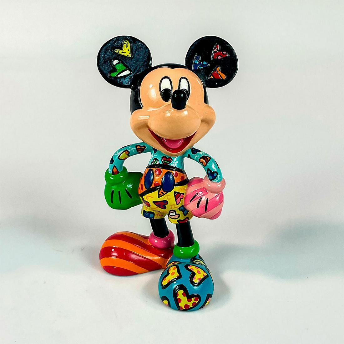 Disney Romero Britto Figurine, Sweetheart Mickey Mouse: Colorful resin character with hearts throughout body design. Disney Britto backstamp. Romero Britto signature on foot. Artist: Romero Britto Issued: 2010 Dimensions: 2.25"L x 2"W x 4"H Manufacturer: W