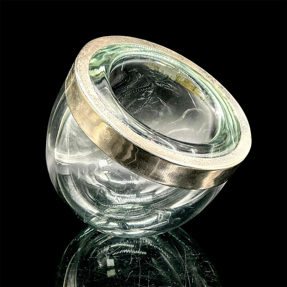 Alfredo Barbini (Italian, 1912-2007) Glass Bowl: Thick glass angled bowl with chrome rim. Alfredo Barbini was an Italian Murano glass artist. Issued: Circa 1970 Dimensions: 6.25"L x 6.25"W x 7.5"H Country of Origin: Italy