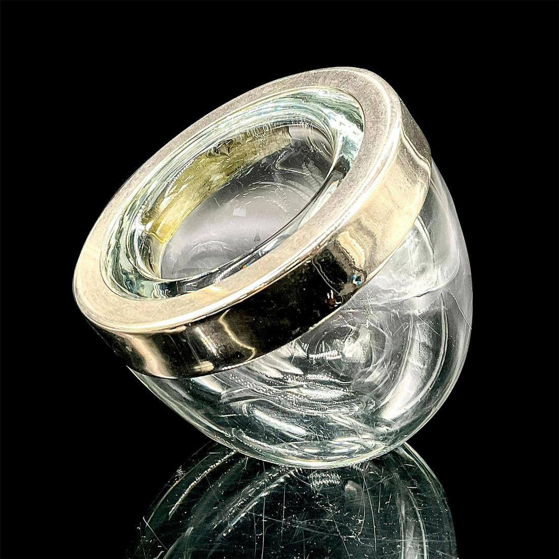 Alfredo Barbini (Italian, 1912-2007) Glass Bowl: Thick glass angled bowl with chrome rim. Alfredo Barbini was an Italian Murano glass artist. Issued: Circa 1970 Dimensions: 5"L x 5.25"W x 5.25"H Country of Origin: Italy