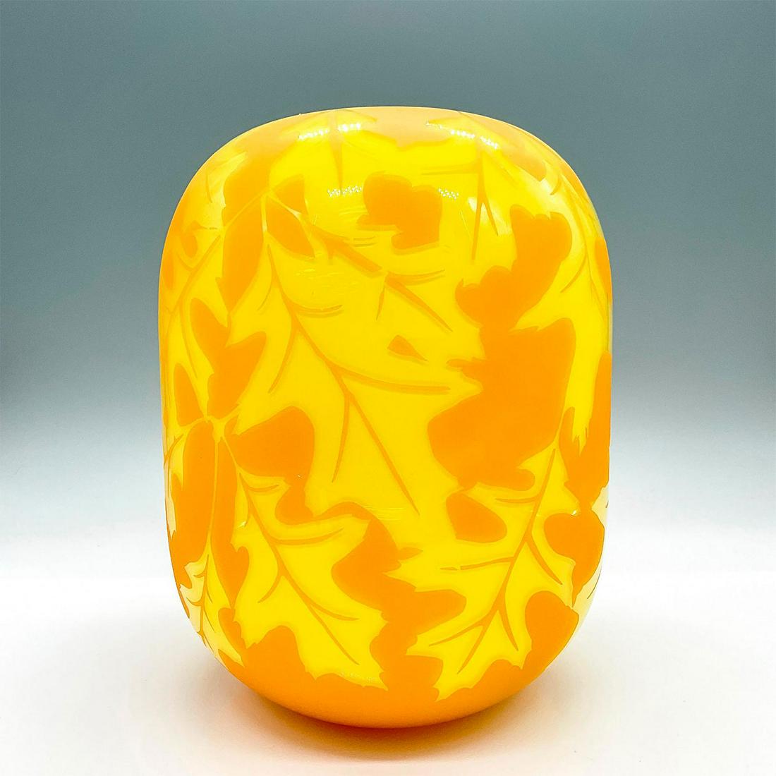 Kelsey Pilgrim Cameo Glass Vase: Orange and yellow bulbous formed vessel decorated with frosted branches and foliate in an orange color scheme. Kelsey Pilgrim etched signature. Artist: Kelsey Murphy Pilgrim Dimensions: 6.5"W x 9"H Co