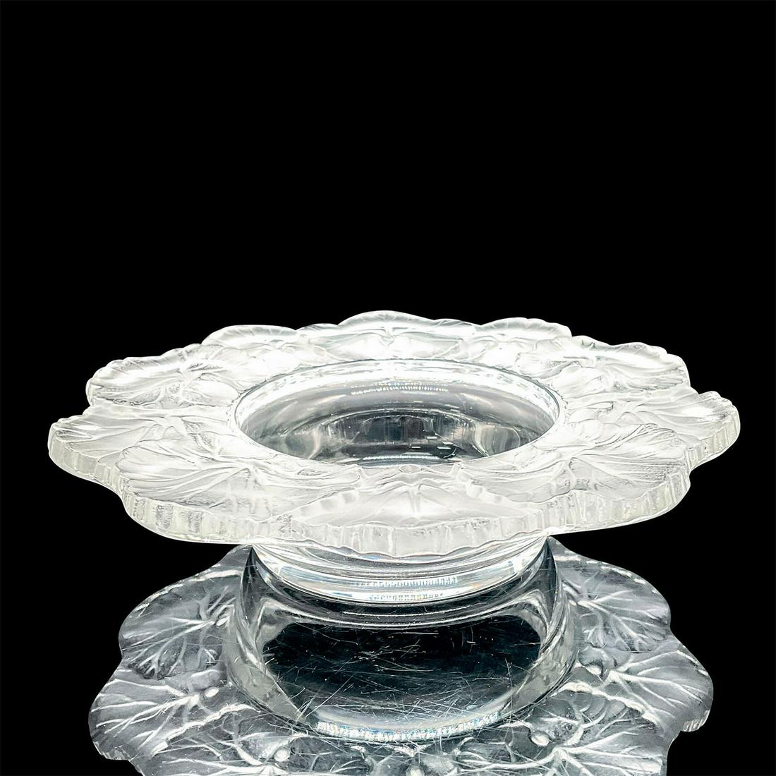 Lalique Crystal Bowl, Honfleur: Raised relief deep rim around the bowl of frosted geranium leaves and the interior bowl is clear crystal. Lalique France etched backstamp. Dimensions: 6"W x 1.5"H Country of Origin: France Manufacture