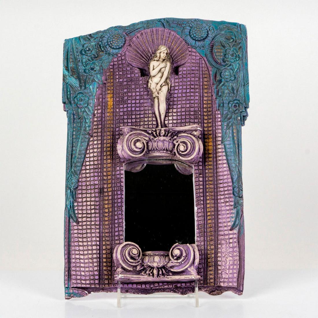 Marc Sijan (American, b.1946), Ceramic Figural Wall Mirror: Ceramic art deco wall mirror with nude female figure. Blue and lavender finish with a small mirror. Marc Sijan signed to right side. Artist: Marc Sijan Dimensions: 9.75"L x 14.5"W x 3.5"H