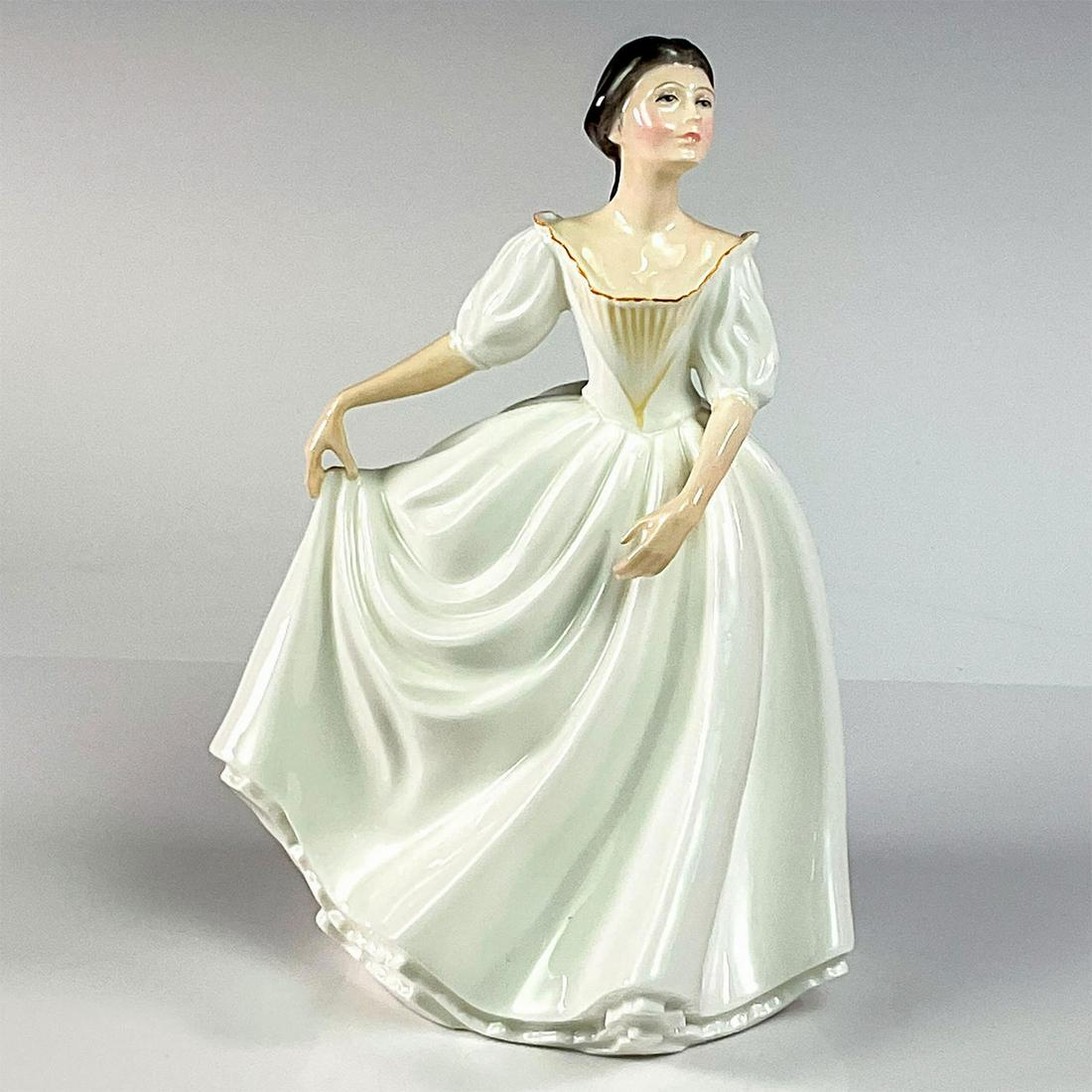 Donna HN2939 - Royal Doulton Figurine: Artist: Peter Gee Issued: 1982 - 1994 Dimensions: 7.75"H Manufacturer: Royal Doulton Country of Origin: England