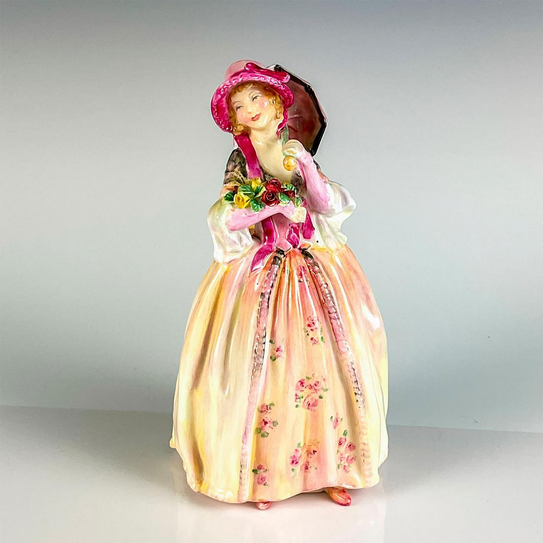 June HN2027 - Royal Doulton Figurine: Artist: Leslie Harradine Issued: 1949 - 1952 Dimensions: 7.25"H Manufacturer: Royal Doulton Country of Origin: England