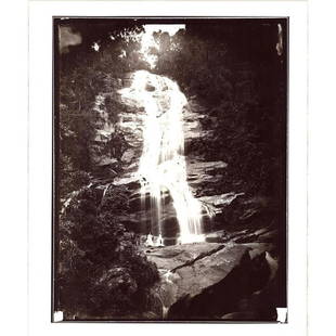 Marc Ferrez (Brazilian, 1843-1923) Silver Gelatin Photograph: Large format silver gelatin photograph from plate with metallic sheen. Depicts two ladies in 19th century style dress at the bottom of the Taunay Waterfall in Tijuca Forest, Rio de Janeiro, Brazil. Fe