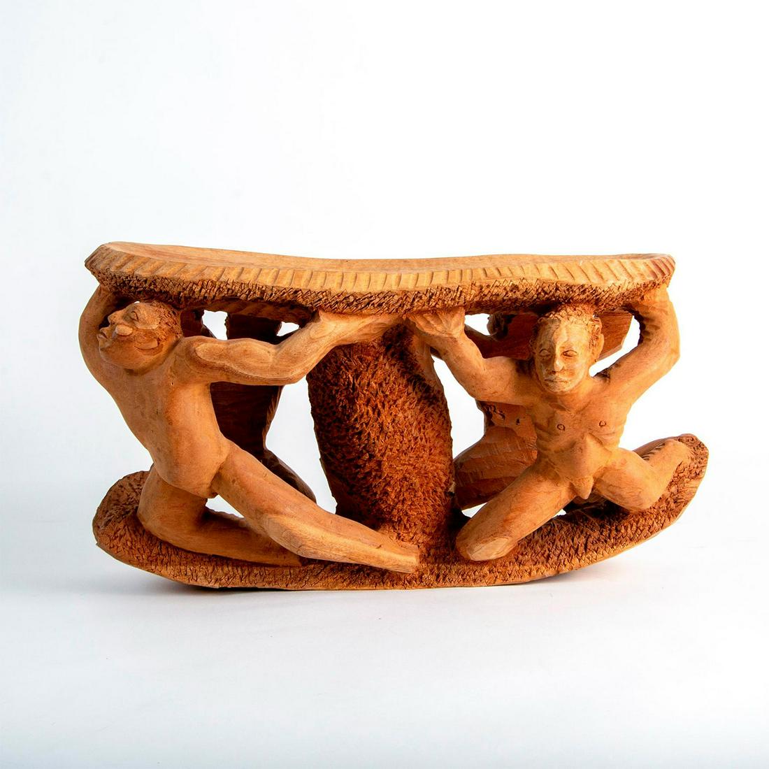 Nacius Joseph (Haitian, b.1939) Carved Wood Sculpture: Haitian sculptor Nacius Joseph hand carved this figurative centerpiece from a single piece of wood. It represents four nude men with arms outstretched, holding an offering platter that is supported at