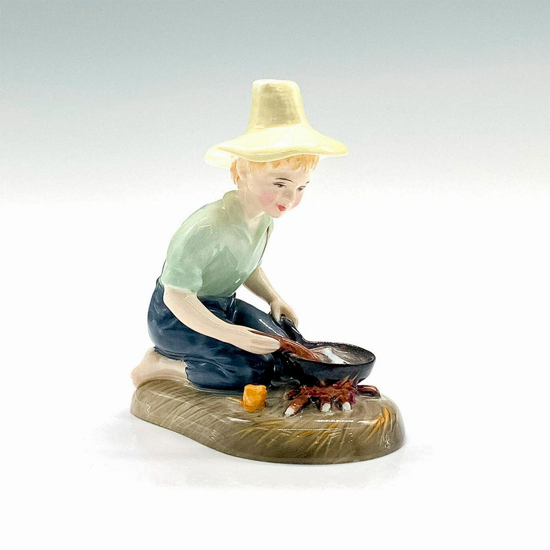 River Boy HN2128 - Royal Doulton Figurine: Bone China figurine. Boy in blue shirt and green pants with yellow hat cooking fish in a pan over fire. Royal Doulton backstamp on bottom. Artist: Peggy Davies Issued: 1962 - 1975 Dimensions: 3.5"L x 