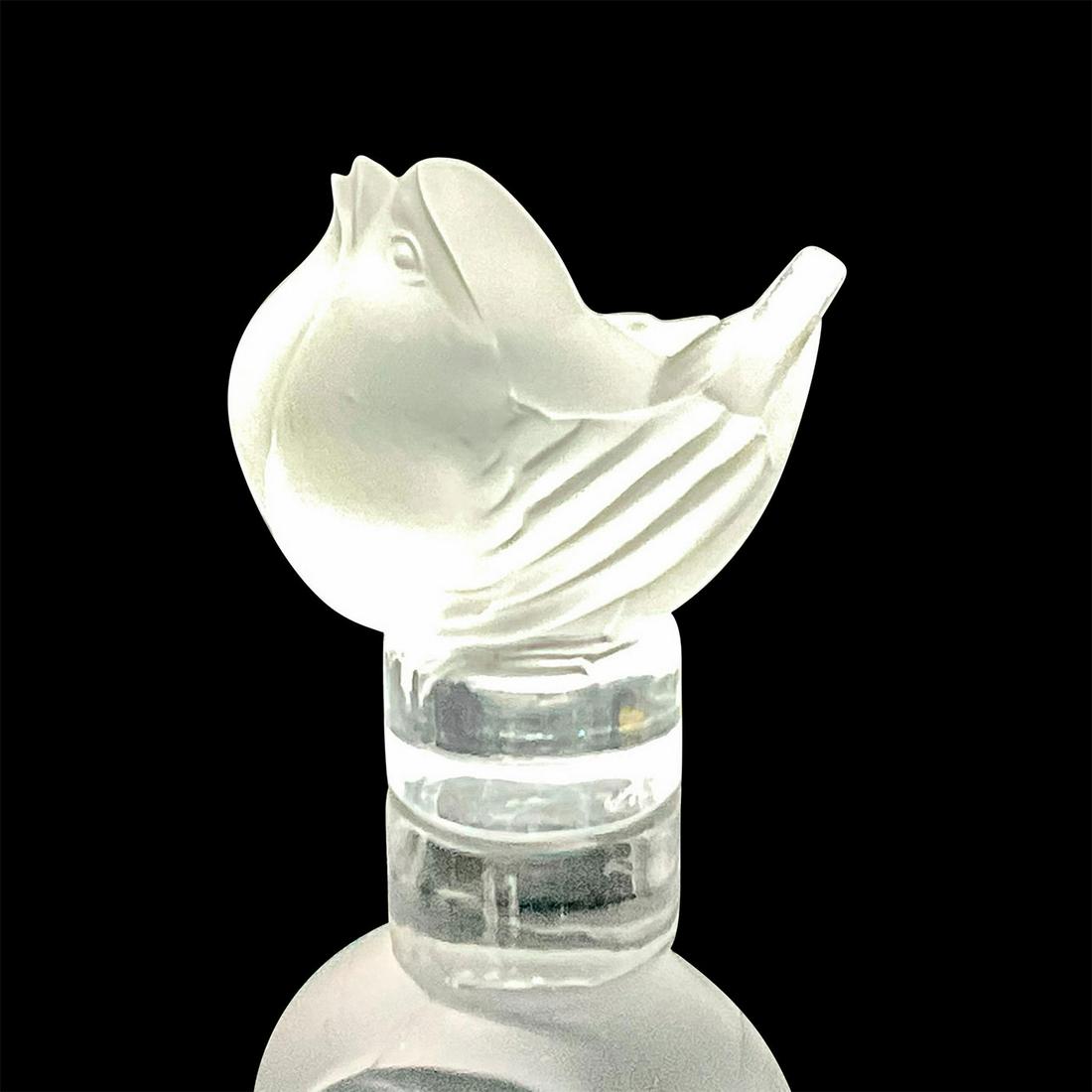 Lalique Crystal Mini Sparrow Paperweight: An adorable tiny figure of a sparrow with its head up. Signed Lalique France in script. Dimensions: 1.75"L x 1.25"W x 1.75"H Manufacturer: Lalique Country of Origin: France