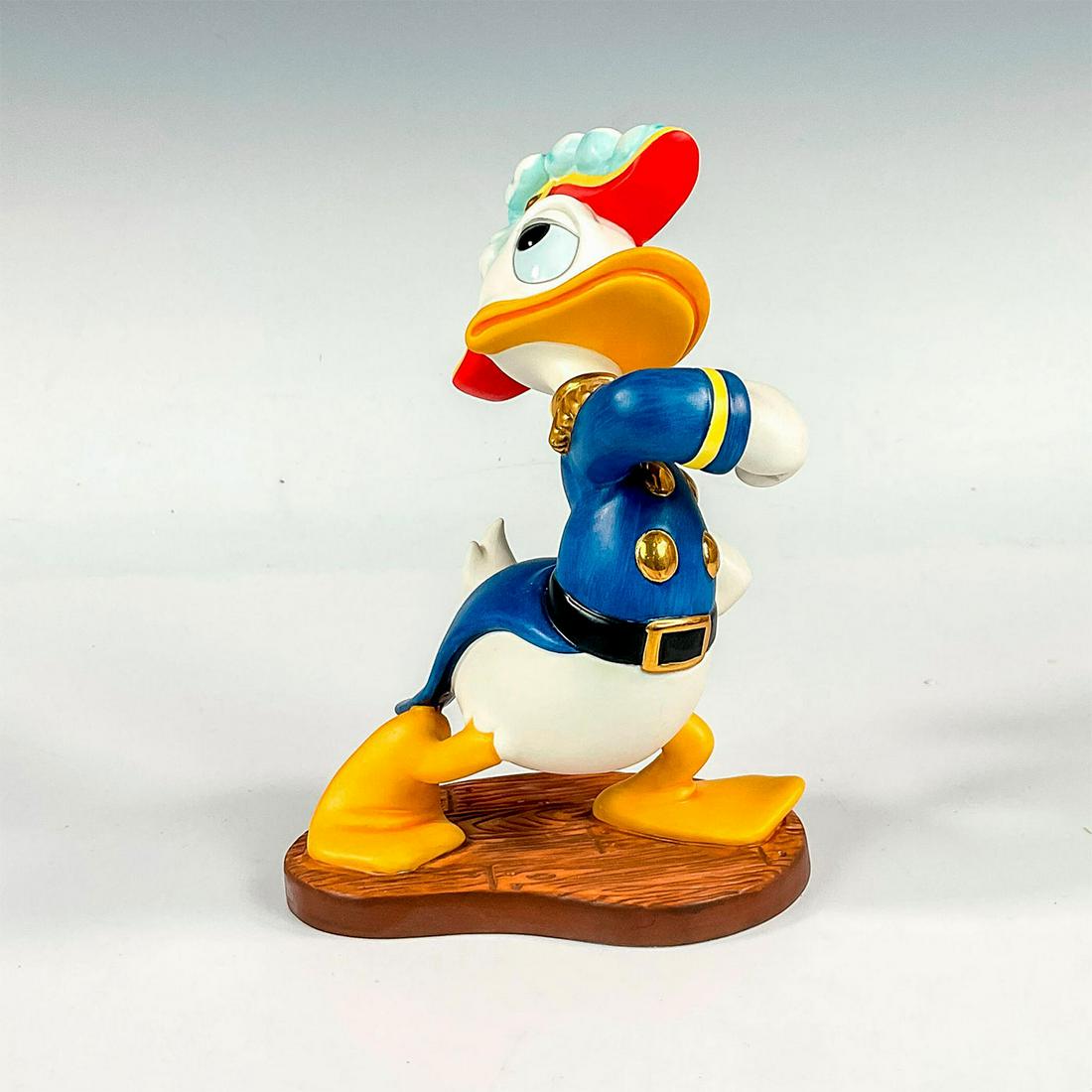 Walt Disney Classics Figurine, Sea Scouts Admiral Duck: Porcelain figure with matte and gilded finish. Walt Disney Collectors Society 1994 Members Only Sculpture. Depicts Donald Duck from the 1939 short animated film, Sea Scouts. Walt Disney Classic Collec