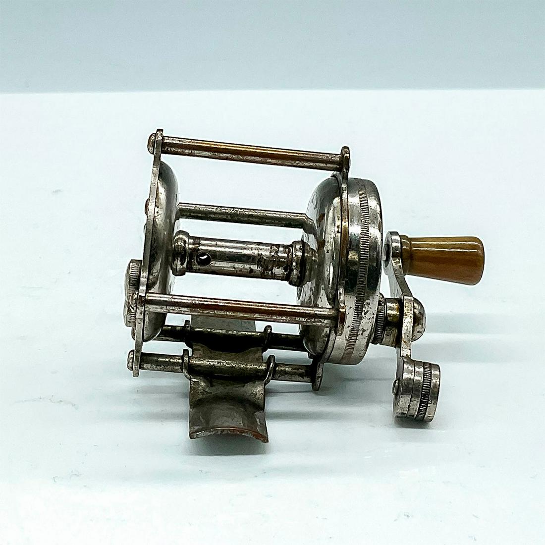 Tiny Trademark Trout Baitcaster Reel with Raised Pillar (1 of 3)