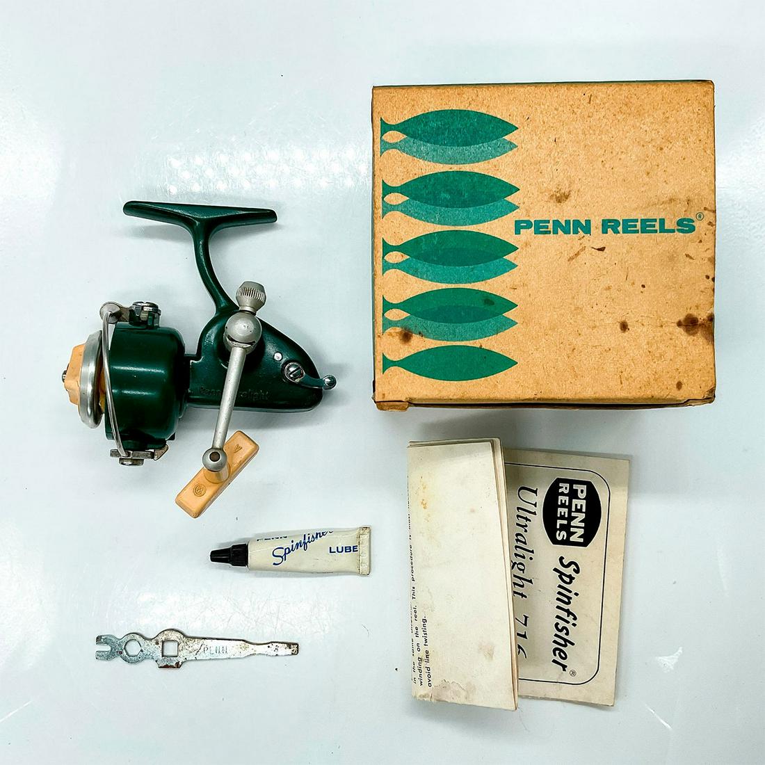 Vintage Penn Ultra Light Spinning Reel No 716 w/Box, Papers: Beautiful Greenie Ultra Light with original box, lube, wrench, and papers. Box has measurements, 5"L x 4.5"W x 3.5"H. Issued: 20th Century Dimensions: 5"L x 4.5"W x 4"H Manufacturer: Penn Country of O