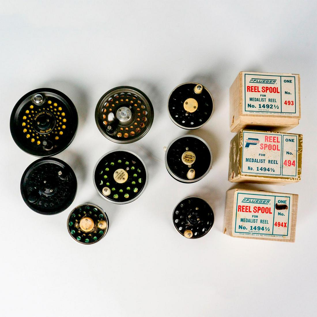 Lot of Vintage Fly-Fishing Spools 11 Spools: Lot of various fly reel spools including Pflueger, Shakespeare, Orvis, Supreme, Cortland, and SA. Largest one measures 3.25"L x 2.5"W x 3.25"H. Issued: 20th Century Dimensions: 13.5"L x 8"W x 4"H Coun