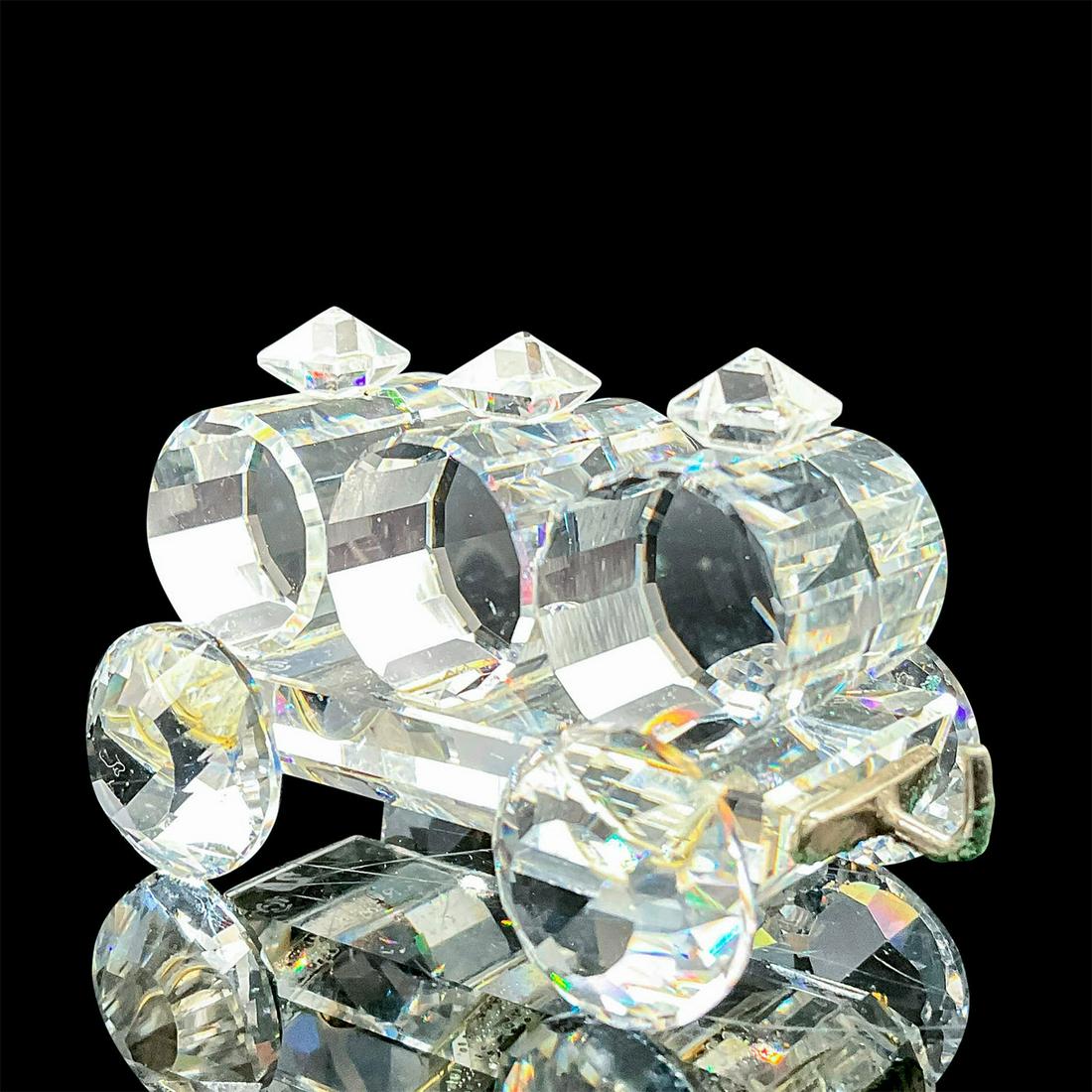 Swarovski Silver Crystal Figurine, Petrol Wagon 015151: Lead crystal wagon that is one of the six pieces of the Silver Crystal Express that was part of the When We Were Young collection. Swarovski etched backstamp. This item has its original box. Box measu