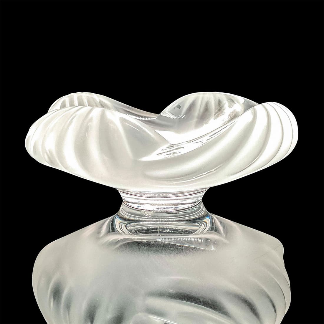 Lalique Crystal Bowl, Frosted Aruba: Beautiful flowing waves transition from frosted crystal around the lip to a clear center of this gorgeous piece. Lalique, France etched backstamp. Dimensions: 7"L x 6.5"W x 3"H Manufacturer: Lalique C