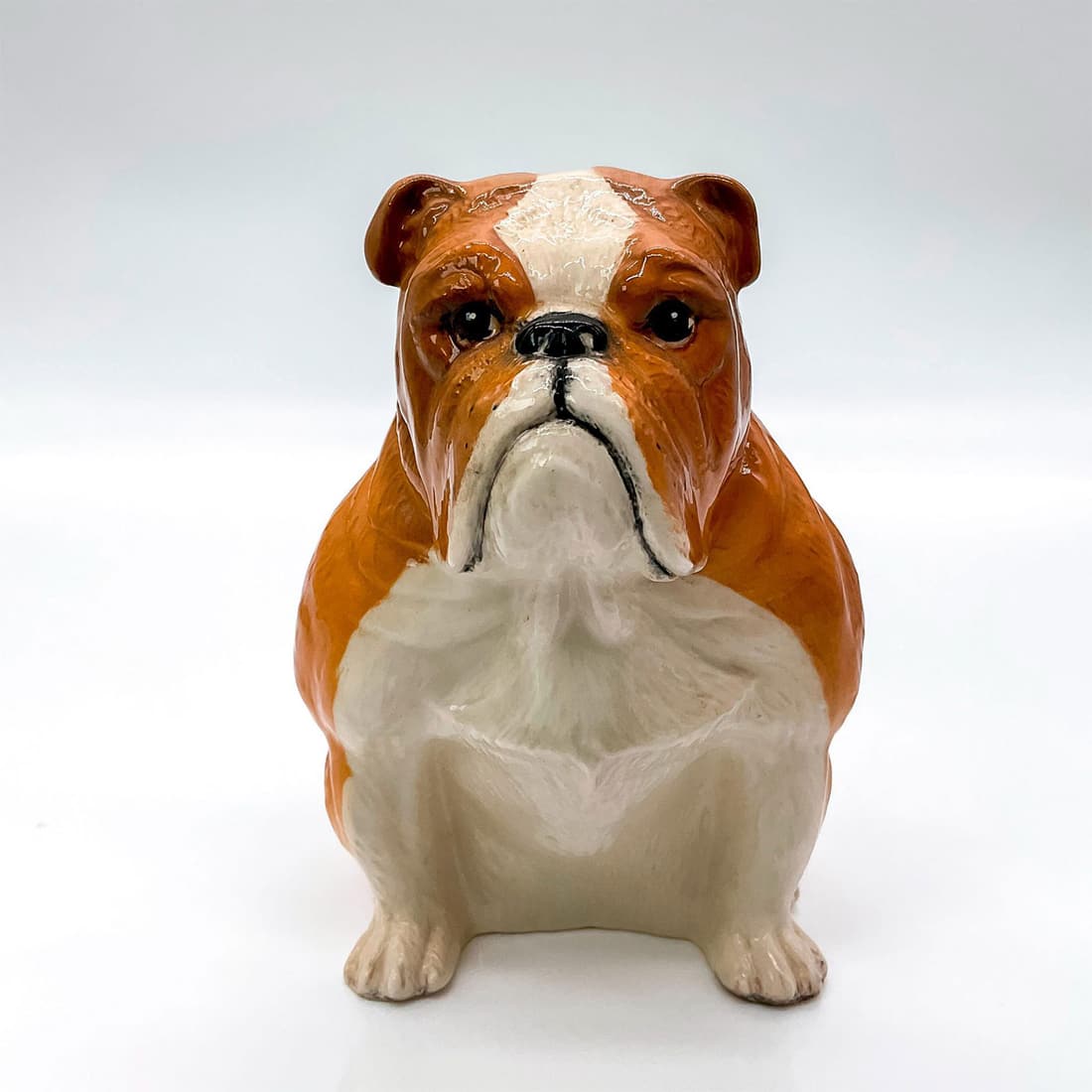 Royal Doulton Figure, Bulldog DA222: Limited edition, special colorway exclusively made for Yesterdayâ€™s Doulton Collectors Fairs. Modeled as a seated bulldog in white and fawn coloration. Royal Doulton backstamp. Artist: Warren Pl