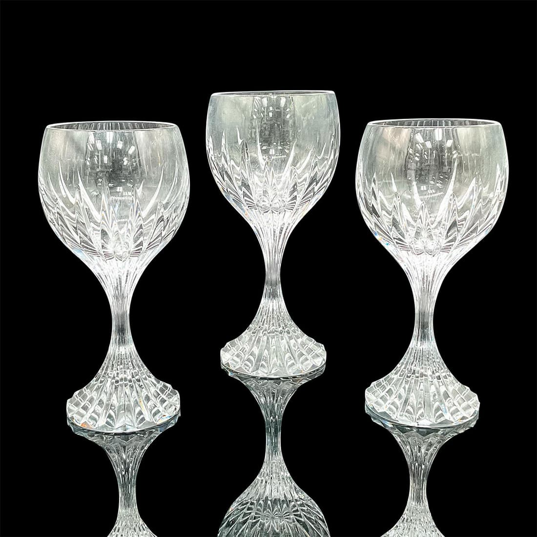 3pc Baccarat Crystal Massena Glassware: Includes 1 water goblet, an 2 wine glasses. Clear with vertical cuts from the foot, over the stem, and on the bowl. Baccarat Crystal etched marks on the bases. Water goblet: 3.5"W x 7"H. Wine Glass: 3