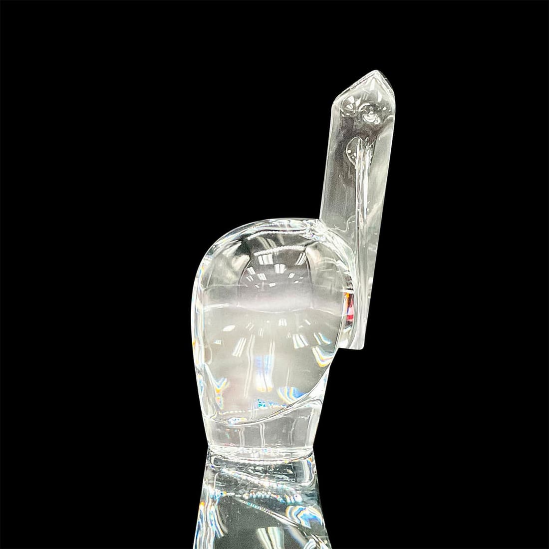 Baccarat Crystal Stork Figurine: A transparent figure of seated long-billed bird. Baccarat etched on the base. Dimensions: 3.25"L x 2.5"W x 6.25"H Manufacturer: Baccarat Country of Origin: France