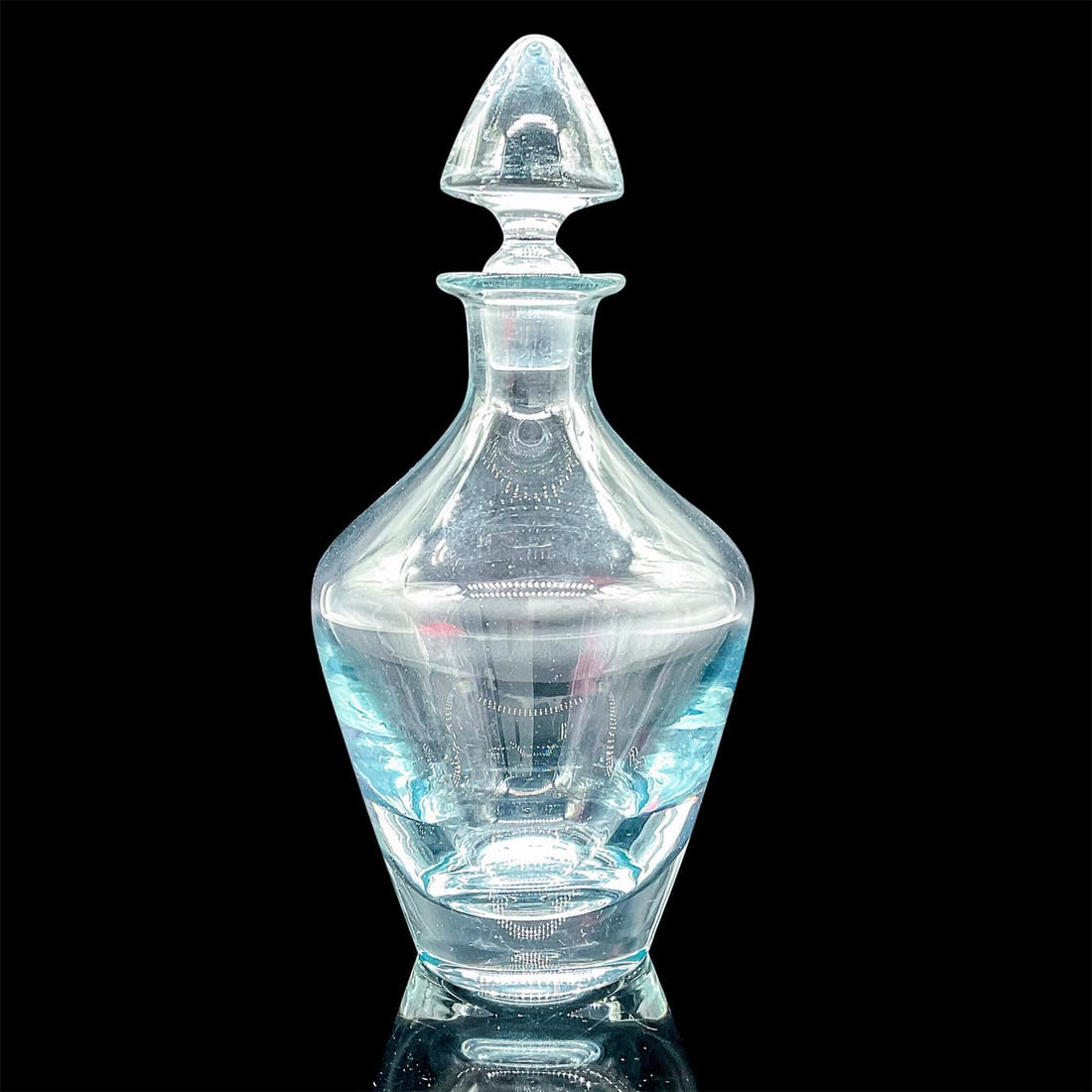 Vintage Glass Decanter with Stopper: A clear glass in the form of a teardrop with matching stopper. Dimensions: 4”W x 9”H Provenance: Collection of Edward Flower