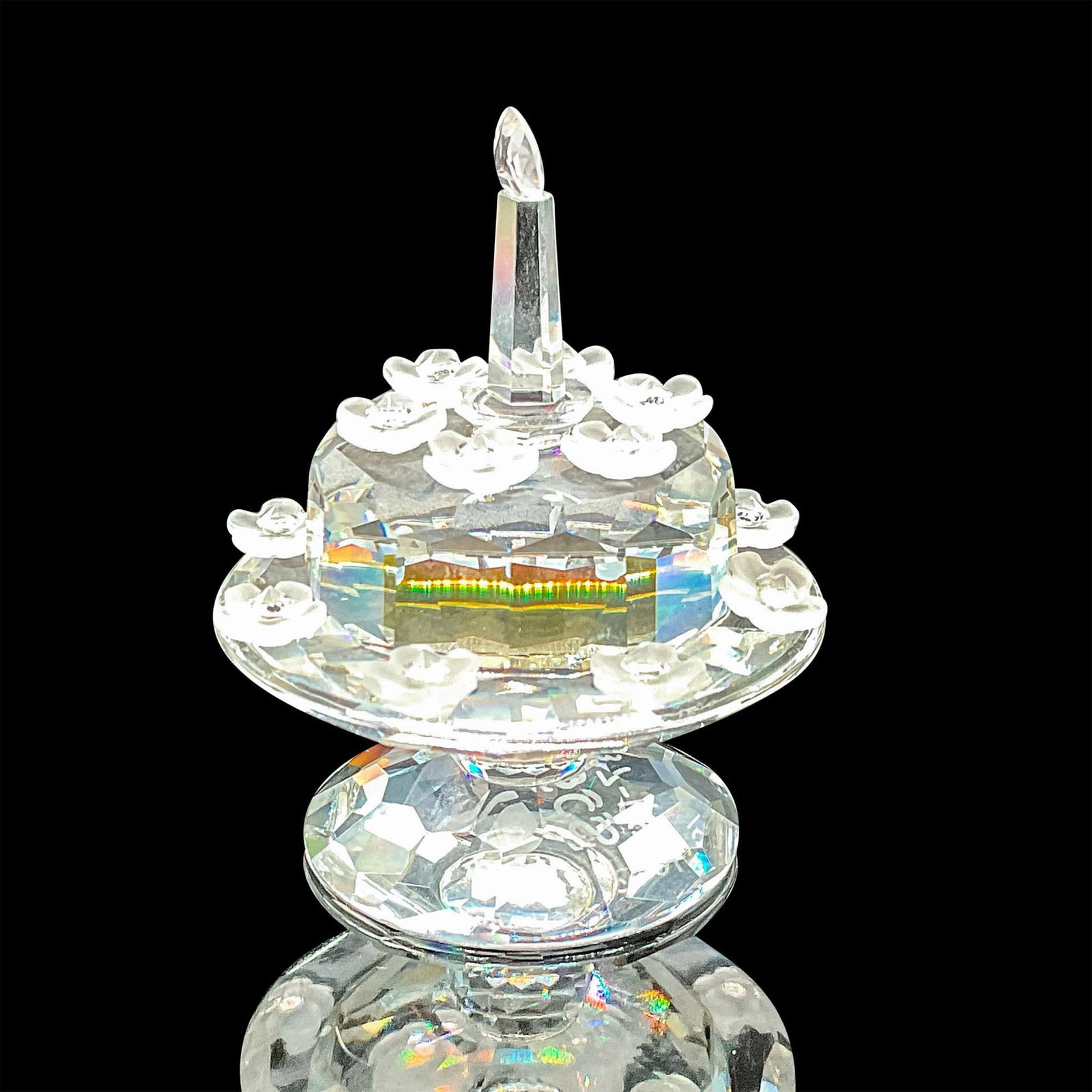 Swarovski Crystal SCS Figurine, 5th Birthday Cake: The Limited Edition Birthday Cake was issued in 1992 to celebrate the 5th Anniversary of the Swarovski Collectors Society. The cake sits on a pedestal tray. The cake and the plate are faceted clear cr