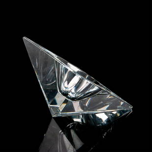 Baccarat Crystal Ashtray: Unique and elegant ashtray in the shape of a triangle shaped pyramid. Baccarat etched backstamp. Dimensions: 3"L x 5.5"W x 4"H Manufacturer: Baccarat Country of Origin: France