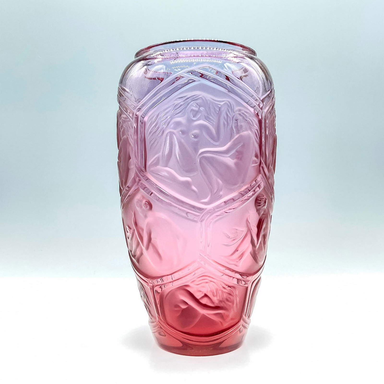Lalique Rose Lilac Crystal Vase, Hesperides: This gorgeous vase is a remarkable piece crafted in a tapering cylinder form using satin and clear crystal. It features a low relief honeycomb pattern, with each space delicately filled with the depic