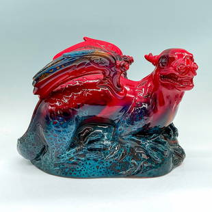 Royal Doulton Flambe Dragon Figurine: Red glaze in high relief; orange and black coloration to base. Exquisite detail and designs. Royal Doulton Flambe backstamp. Artist: John Bromley Issued: c. 1973-1996 Dimensions: 11"L x 7.75"W x 7.75"