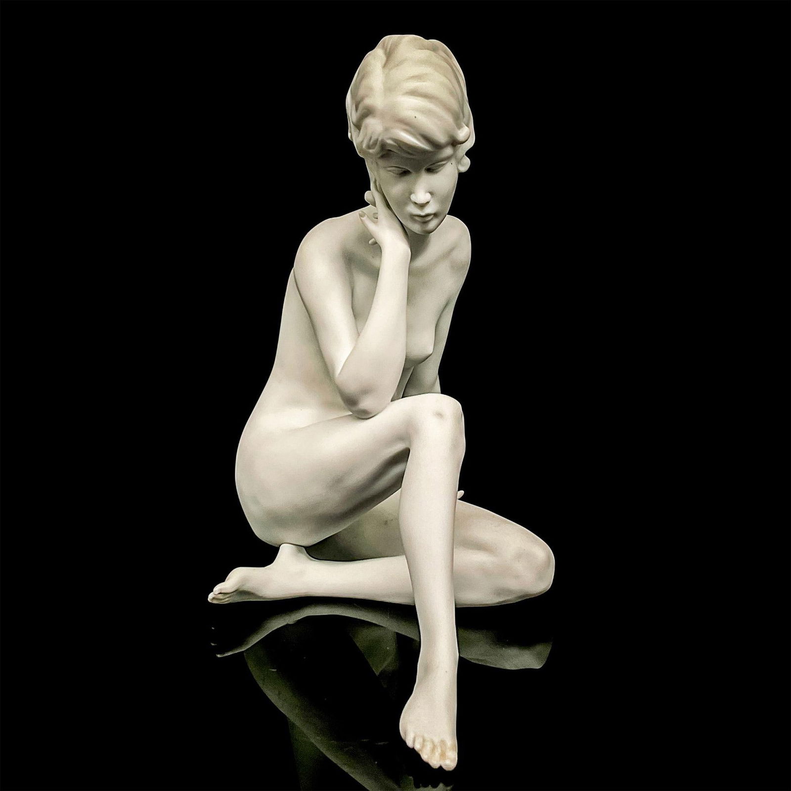 Kaiser Porcelain Nude Sculpture, Meditation: Figure of a seated woman in meditation. Here eyes are shut with a delicate hand resting on her cheek. Bisque finish. Artist signed. Kaiser W. Germany backstamp. Artist: Gawantka Issued: c. 1970-1990 D