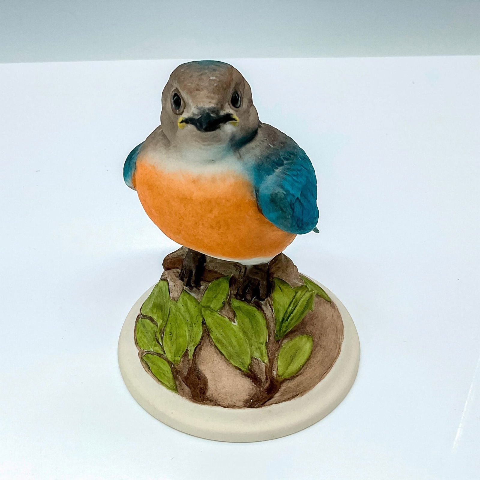 Edward Marshall Boehm Bird, Baby Blue Bird: Edward Marshall Boehm Studios Porcelain Figurine Bird, Baby Blue Bird #442 Y. Boehm backstamp. Issued: 20th Century Dimensions: 3.5"L x 3.5"W x 5"H Manufacturer: Edward Marshall Boehm Country of Origi