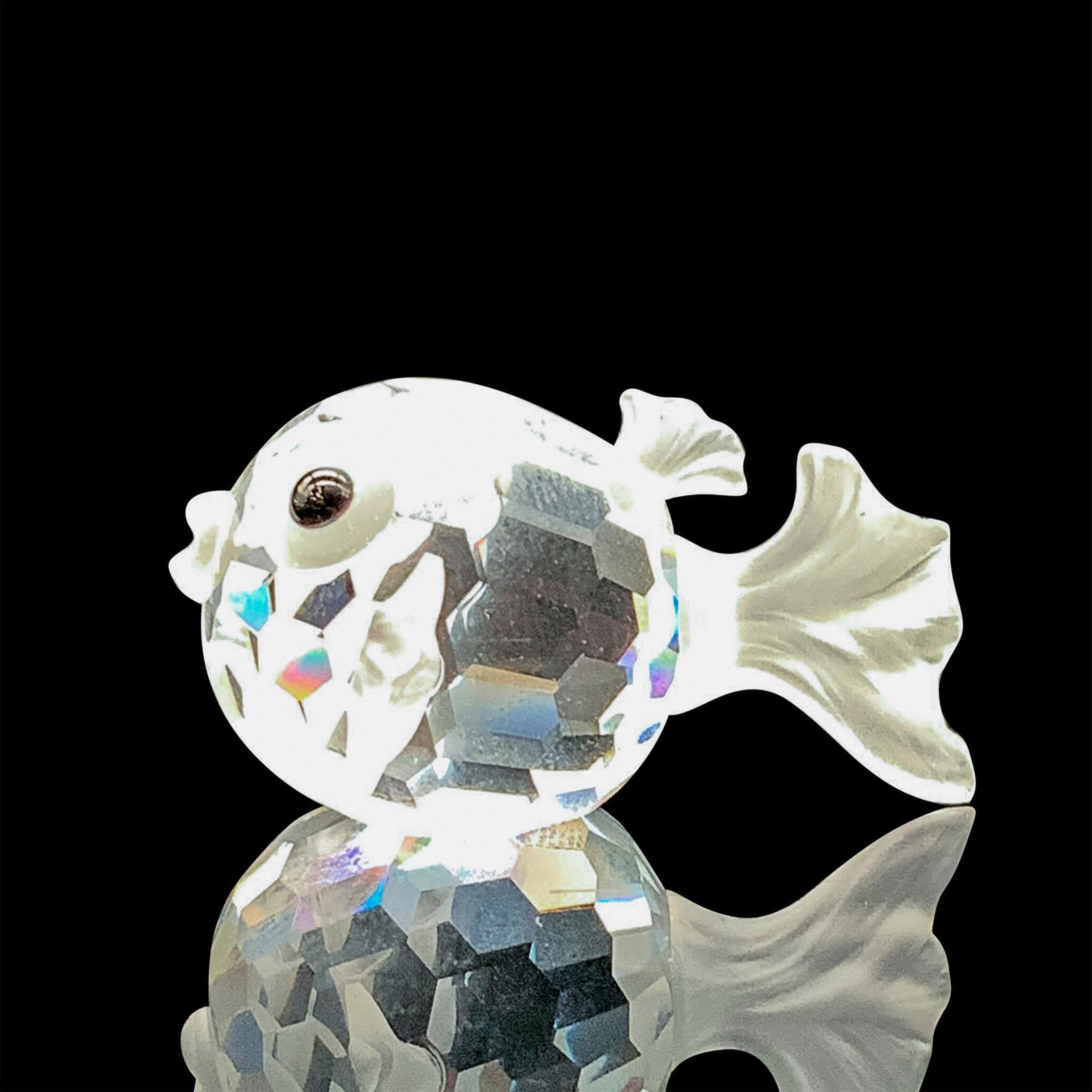 Swarovski Crystal Figurine, Miniature Blowfish: Depicts a tiny, inflated blowfish with fogged crystal for the fins and black crystal for the eyes. Swarovski backstamp. This item has its original box. Dimensions of original box: 2.5"H x 3.25" dia. D