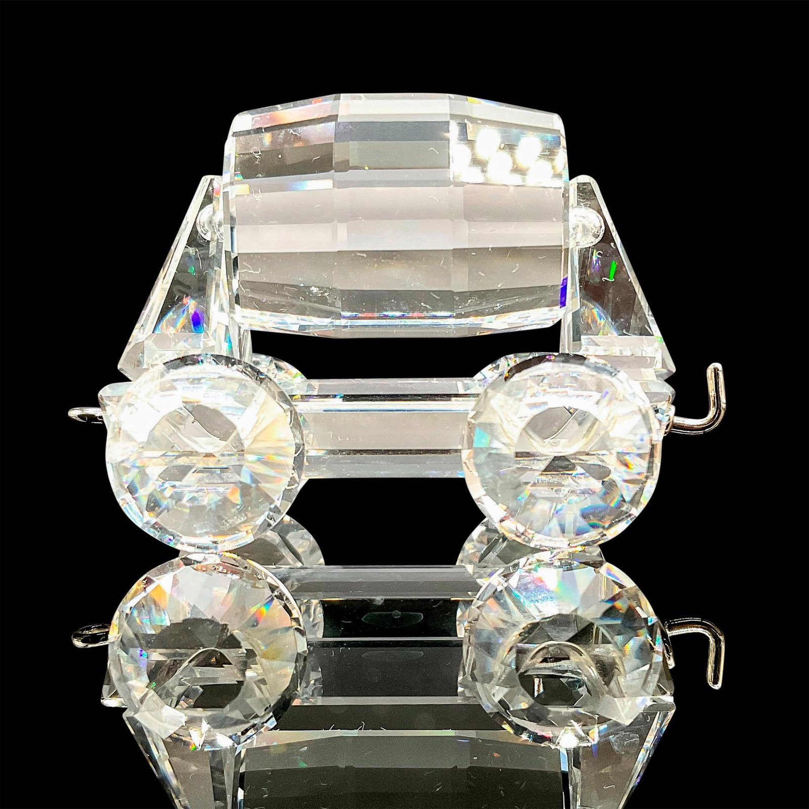 Swarovski Silver Crystal Figurine, Tipping Wagon: Sparkling faceted crystal figurine modeled as a tipping wagon. Bucket swings back and forth. Hook and eye loop fixed to front and back. Part of set. Swarovski acid marks. This item has its original bo