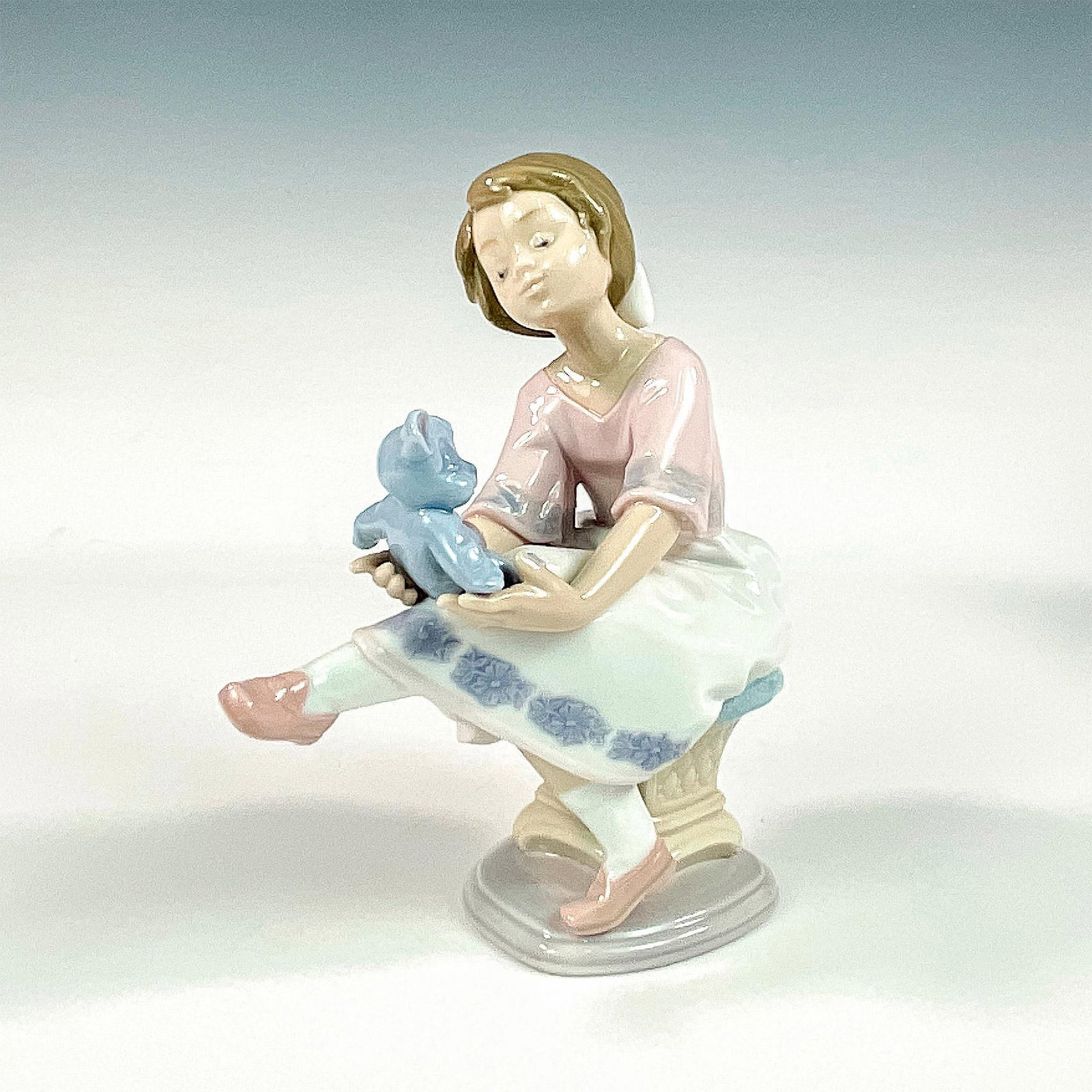 Best Friend 1007620 - Lladro Porcelain Figurine: Glossy finish; Lladro backstamp. Includes original box measuring 10"L x 9"W x 6.5"H. Artist: Francisco Polope Issued: 1993 - 1993 Dimensions: 6.25"H x 5"W Manufacturer: Lladro Country of Origin: S