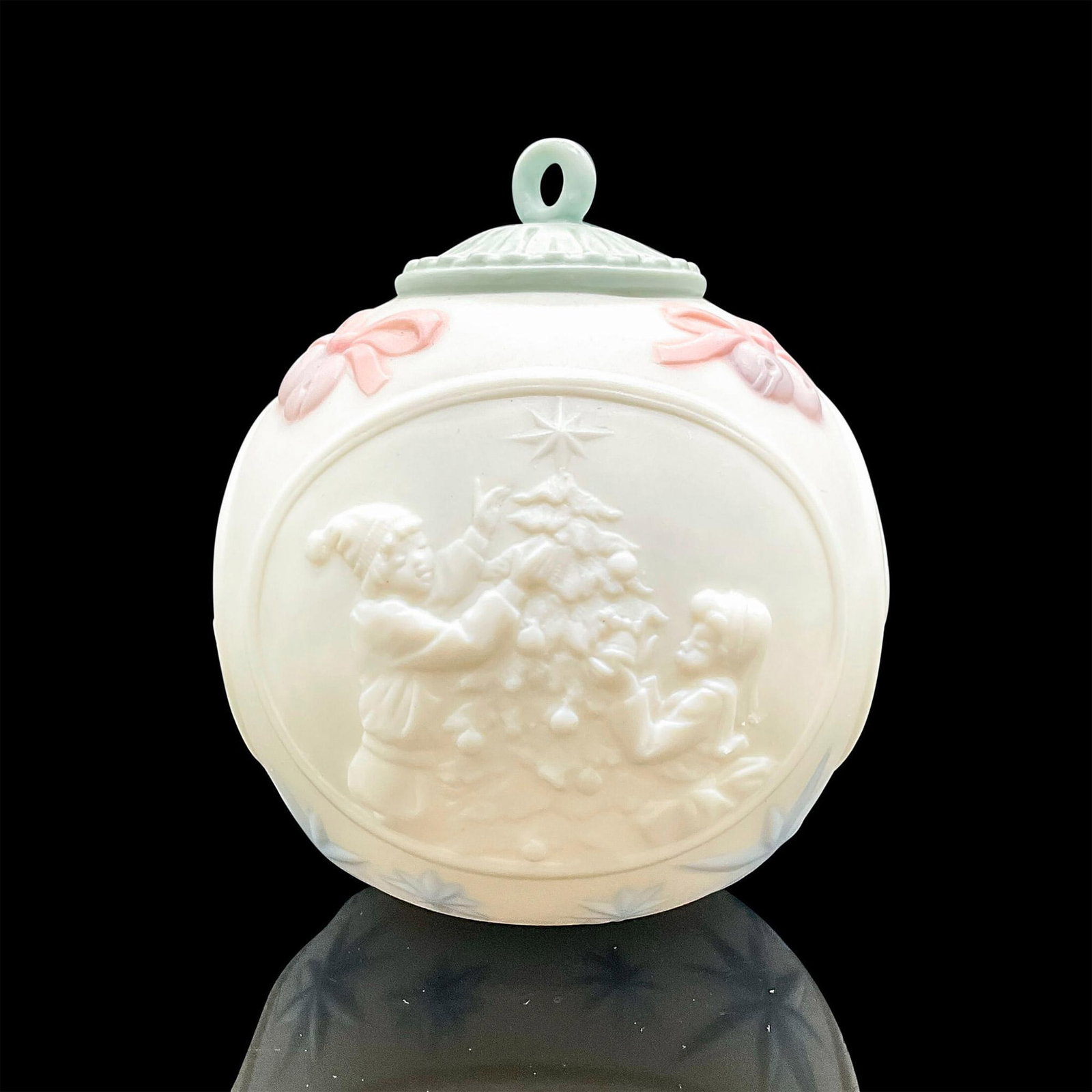 1995 Christmas Ball 1016207 - Lladro Porcelain Ornament: Matte finish; Lladro backstamp. Includes original box measuring 4.75"L x 4.25"W x 3.75"H. Artist: Design & Decoration Dept. Issued: 1995 Dimensions: 3.25"H Manufacturer: Lladro Country of Origin: