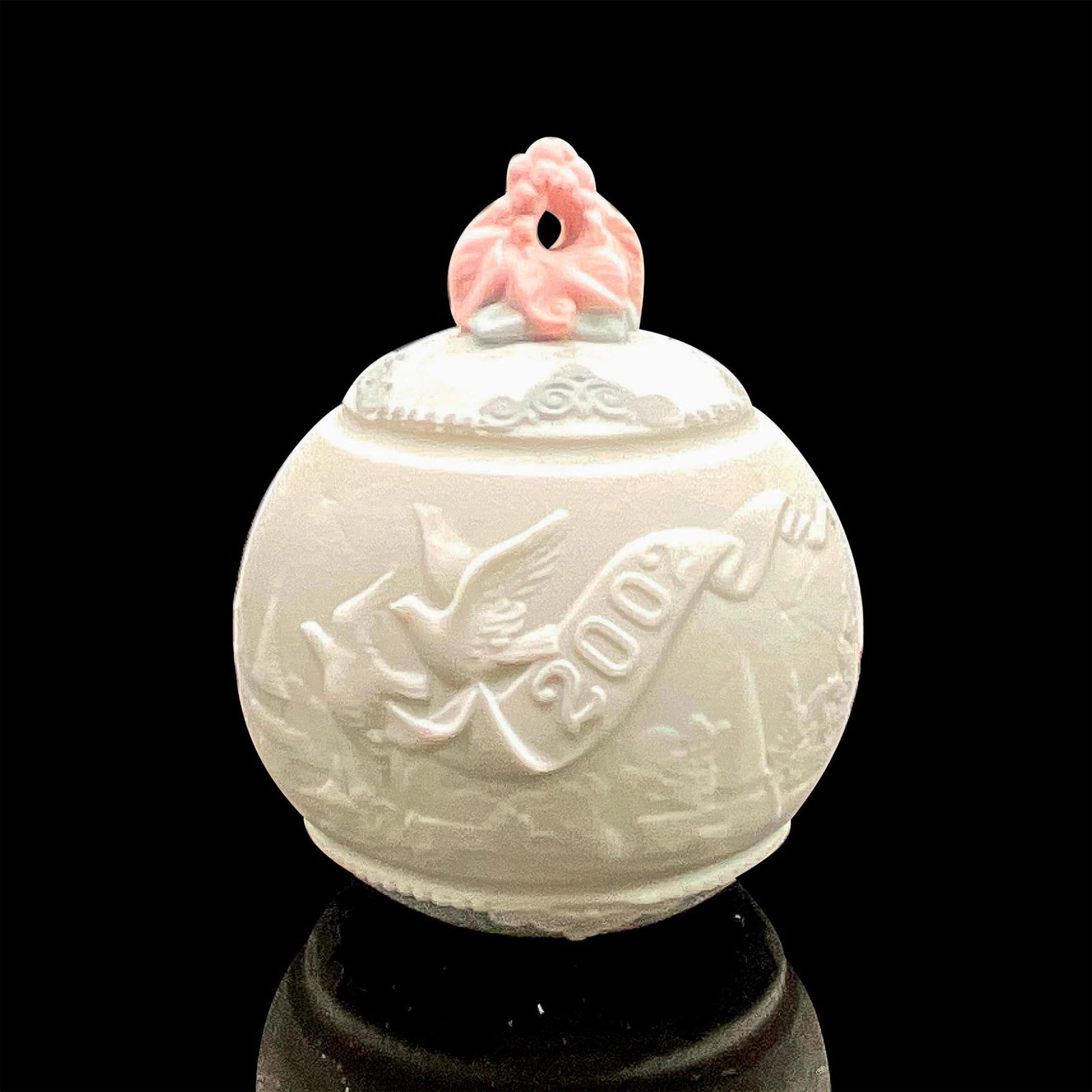 2002 Christmas Ball 1016722 - Lladro Porcelain Ornament: Matte finish; Lladro backstamp. Includes original box measuring 5"L x 4.5"W x 4.25"H. Artist: Marco Antonio Nogueron Issued: 2002 - 2002 Dimensions: 4"H Manufacturer: Lladro Country of Origin: Spa