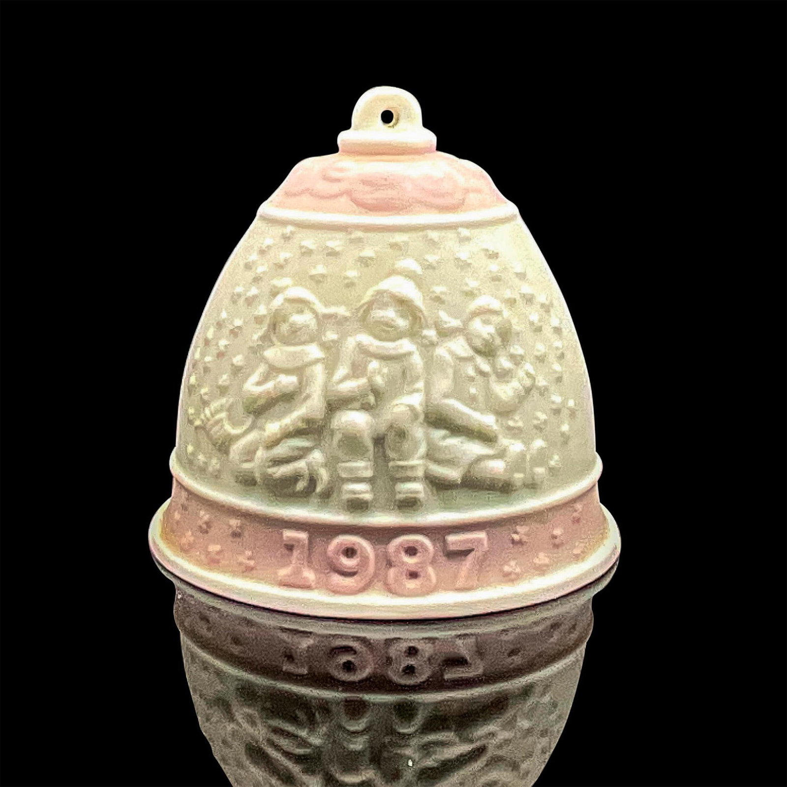 1987 Christmas Bell 1015458 - Lladro Porcelain Ornament: Matte finish; Lladro backstamp. Includes original box measuring 4.75"L x 5"W x 4"H. Artist: Jose Roig Issued: 1987 - 1987 Dimensions: 2.75"H Manufacturer: Lladro Country of Origin: Spain