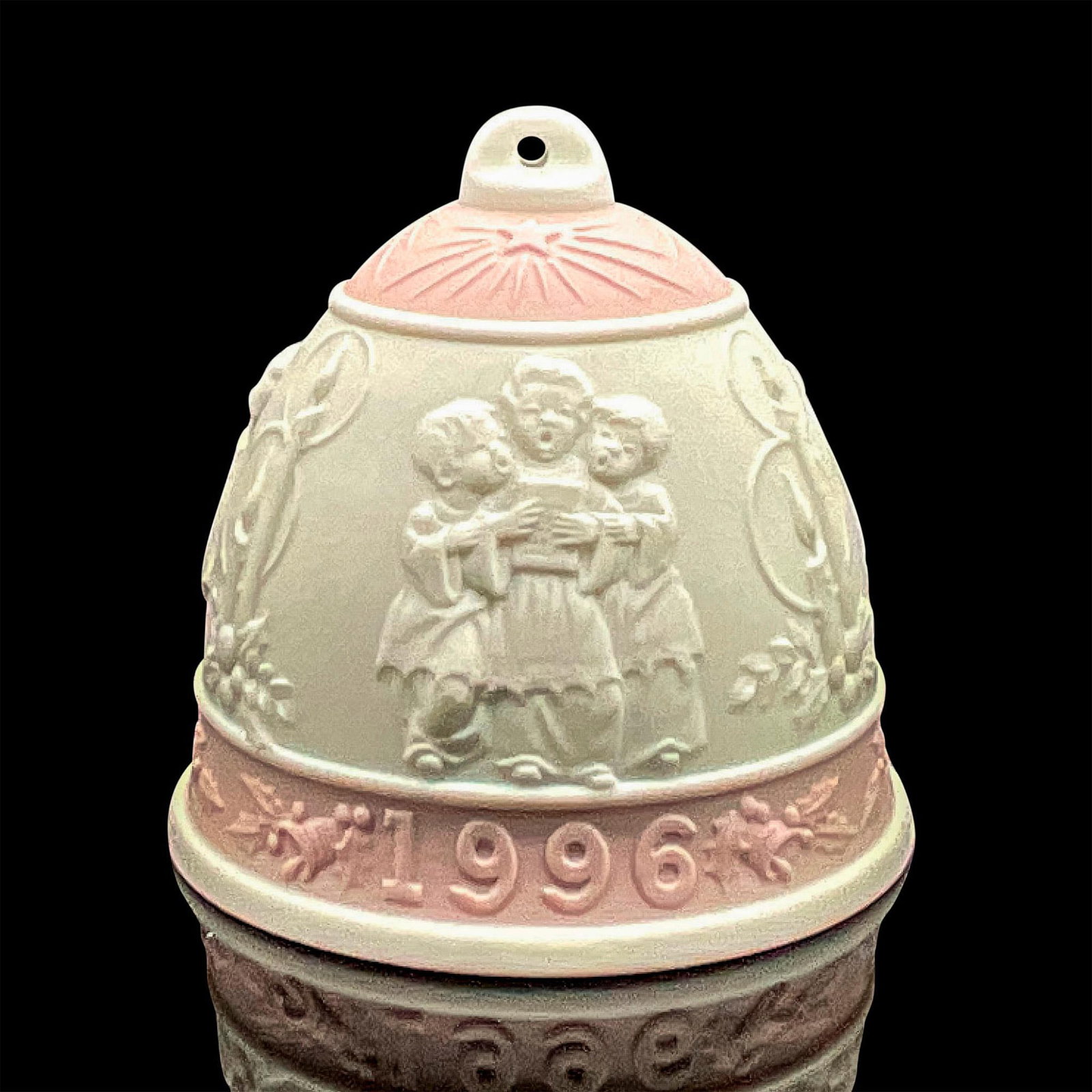 1996 Christmas Bell 1016297 - Lladro Porcelain Ornament: Matte finish; Lladro backstamp. Includes original box measuring 4.75"L x 4.5"W x 4"H. Artist: Design & Decoration Dept. Issued: 1996 - 1996 Dimensions: 3"H Manufacturer: Lladro Country of Origin: