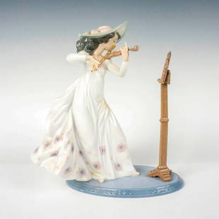 Sweet Symphony 1006243 - Lladro Porcelain Figurine: A glazed figure of a woman playing the violin. Lladro backstamp. Artist: Regino Torrijos Issued: c. 1996-2004 Dimensions: 8.75"L x 6.75"W x 9.5"H Manufacturer: Lladro Country of Origin: Spain