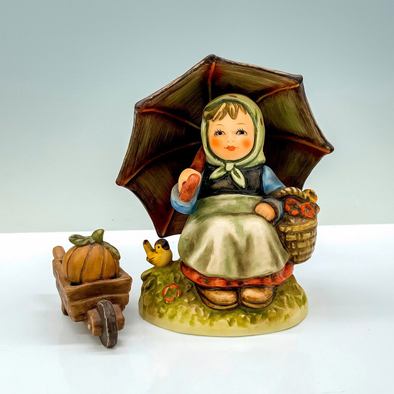 2pc Goebel Hummel Porcelain Figurine, Smiling Through (1 of 3)