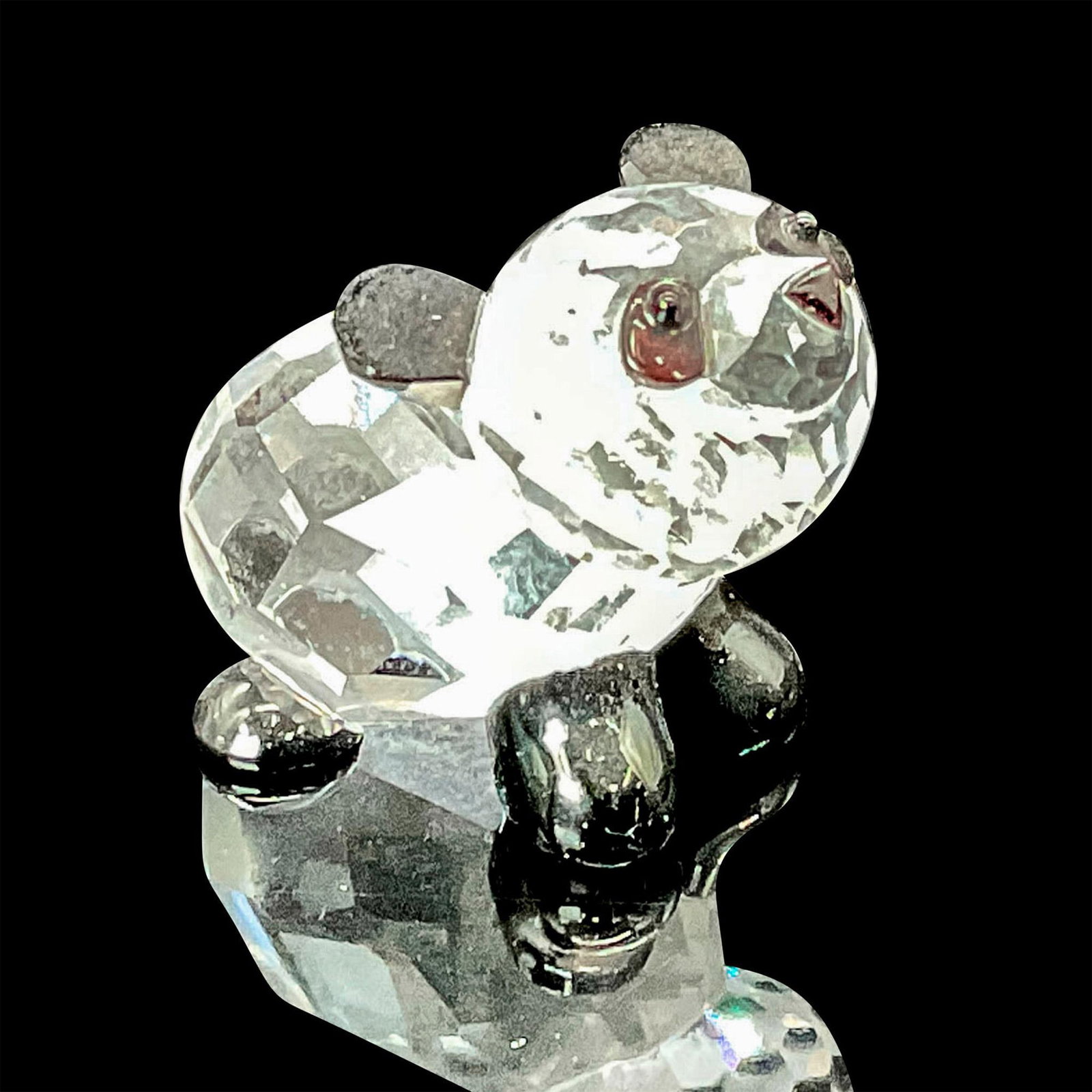 Swarovski Crystal Figurine, Panda Baby: This adorable panda baby figurine is expertly crafted from a combination of clear and black crystal, capturing the lovable charm of this beloved animal. This item has its original box which measures 2