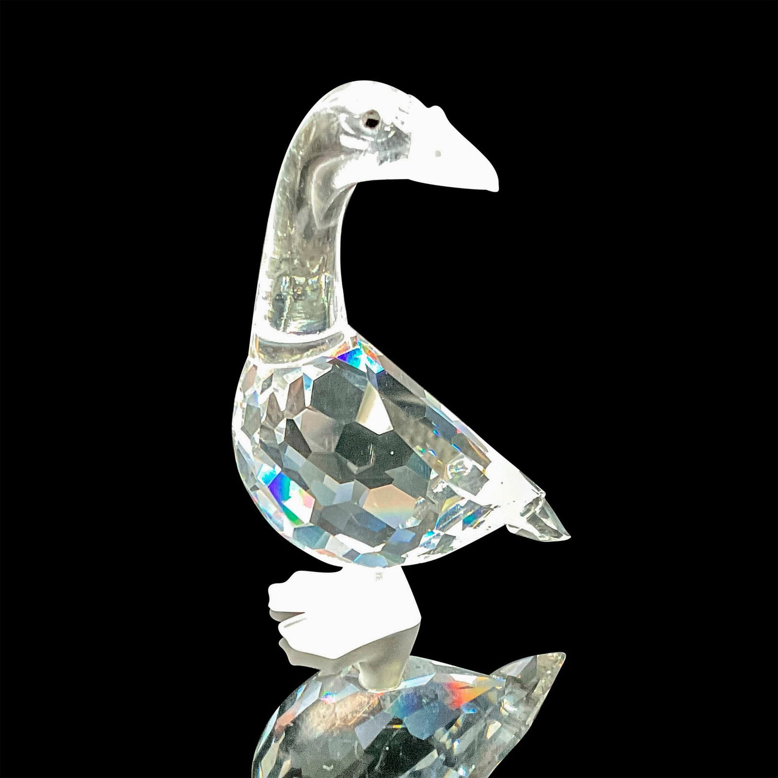 Swarovski Silver Crystal Figurine, Mother Goose: Lead crystal part of Barnyard Friends sires, made with frosted crystal beak and feet. Swarovski etched backstamp. This item has its original box. Box measures: 3.25"W x 4.25"H. Artist: Adi Stocker Iss