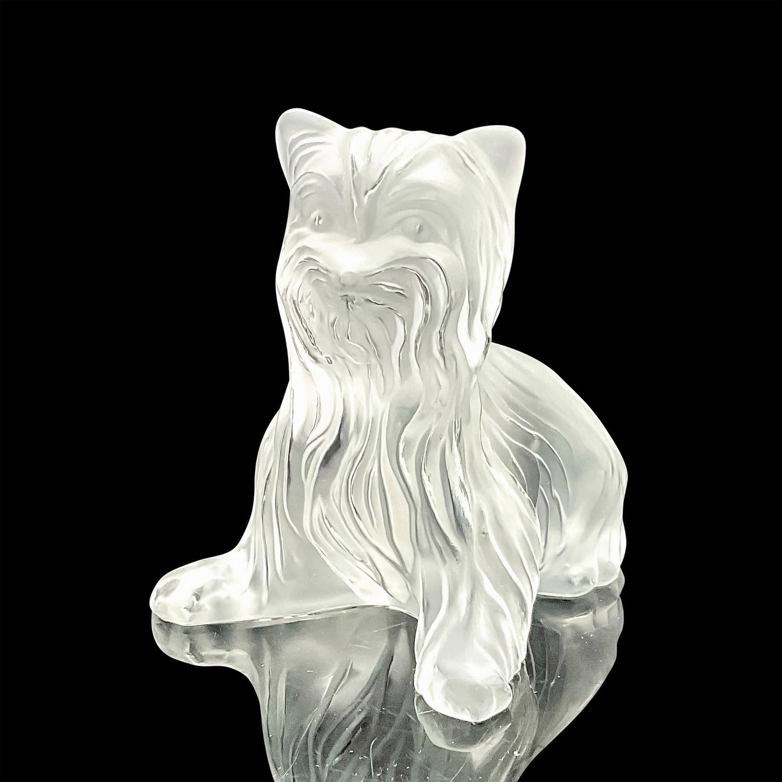 Lalique Crystal Figurine Yorkie Terrier: This crystal figurine features a frosted crystal rendition of a Yorkie Terrier that shows the adorable characteristic of the breed. Dimensions: 3.5"L x 3"W x 3.5"H Manufacturer: Lalique Country of Ori